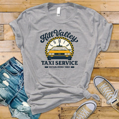Movie Parody T-Shirt - Hill Valley Taxis Est 1985 Design on Softstyle Premium Tee - Funny Graphic Tee with Tracked UK Postage