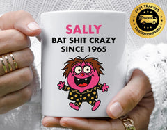 Customisable 60th Birthday Mug for Women – Bat Shit Crazy Design with Custom Name – Multiple Colours Available