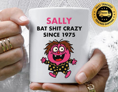 Customisable 50th Birthday Mug for Women – Bat Shit Crazy Design with Custom Name – Multiple Colours Available