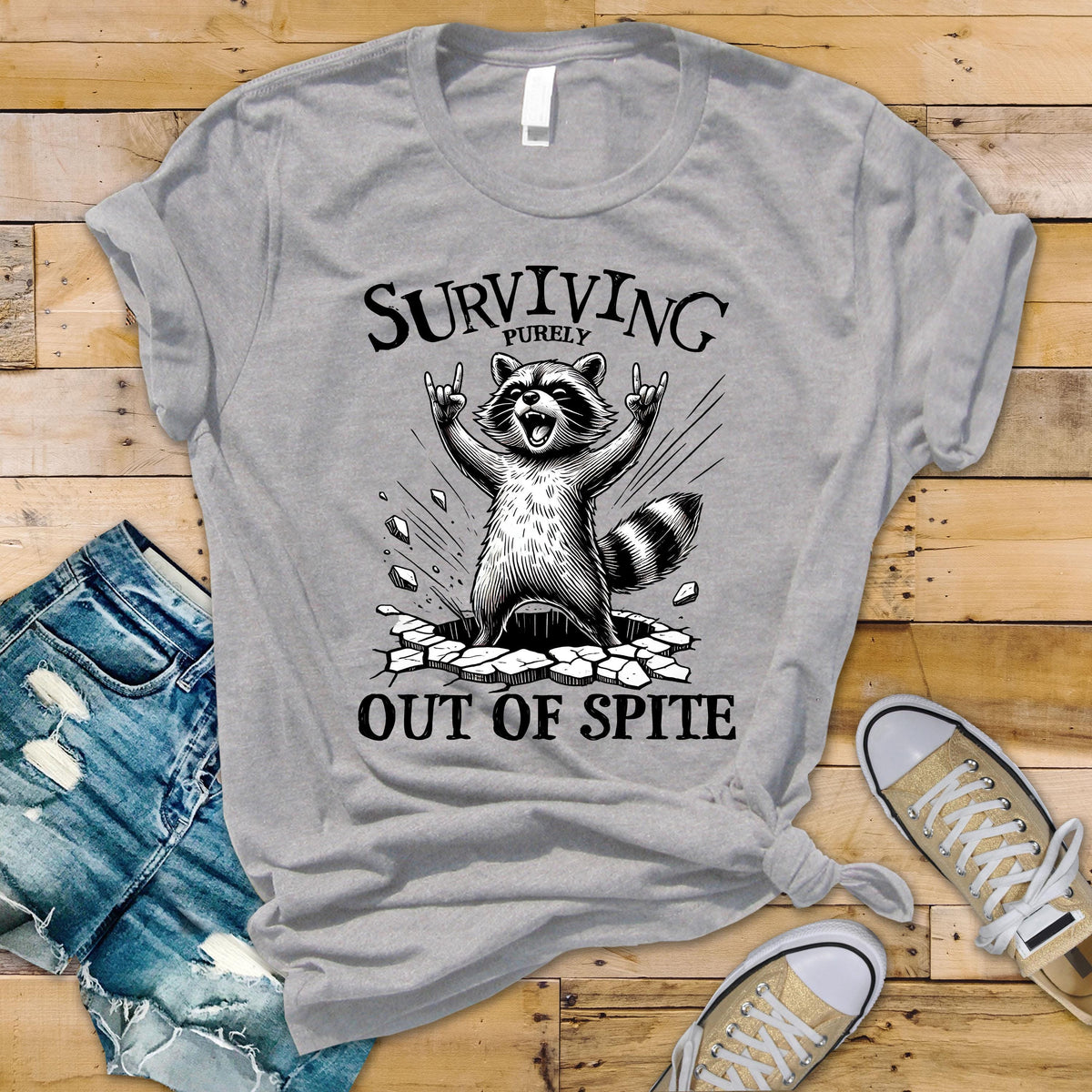 Funny Raccoon T-Shirt: Surviving Purely Out of Spite - Softstyle Tee - Fast UK Tracked Postage