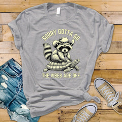 Funny Raccoon Parody T-Shirt - Sorry Gotta Go The Vibes Are Off Graphic Tee on Premium Shirt with UK Tracked Postage